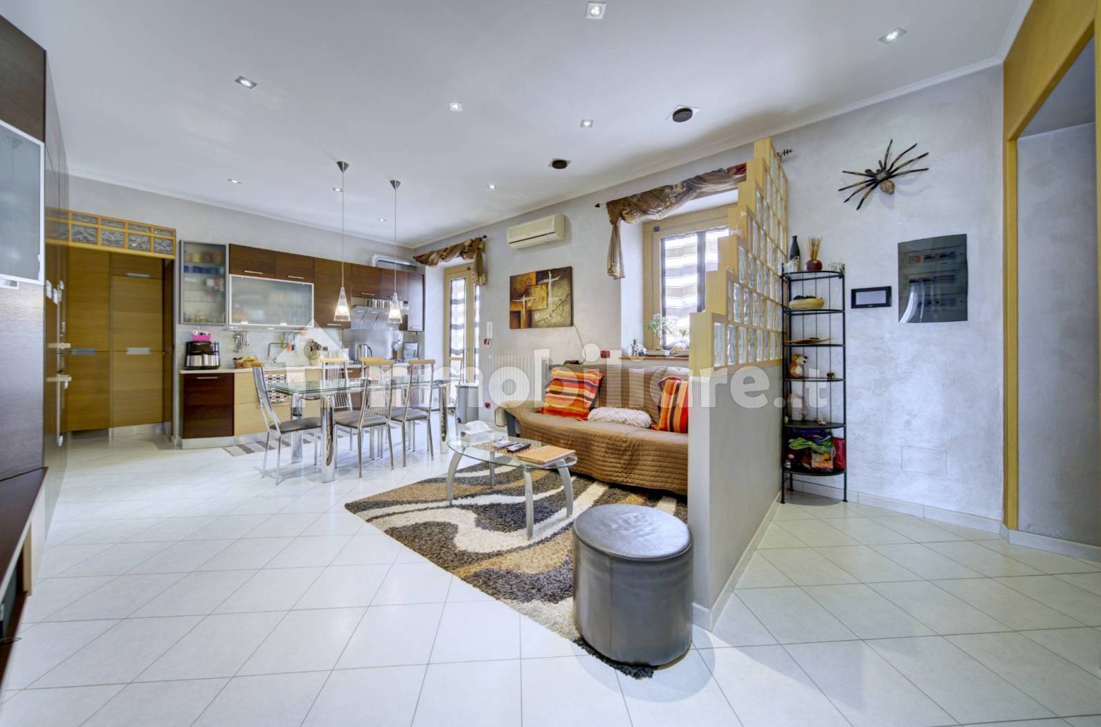 Renovated Three-Room Apartment with Three Balconies on Via Venaria in Turin